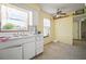 Cozy kitchen with a bright window above the sink and ample cabinet space at 2502 Tropical Shores Se Dr, St Petersburg, FL 33705