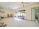 Comfortable living room with sliding doors to the screened in lanai at 2502 Tropical Shores Se Dr, St Petersburg, FL 33705