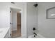 Modern bathroom with a new vanity, quartz countertop, and tiled shower at 2701 Camellia Ter, Punta Gorda, FL 33950