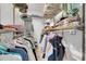 Walk-in closet with clothing racks and shelving; well organized at 3127 W Sligh Ave # 101C, Tampa, FL 33614