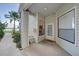 Inviting front porch with ample space and view of the surrounding area at 3127 W Sligh Ave # 101C, Tampa, FL 33614