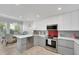 Chic kitchen with modern cabinetry, stainless steel appliances, and ample counter space at 3127 W Sligh Ave # 101C, Tampa, FL 33614