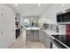 Kitchen featuring stainless steel appliances and modern style at 3127 W Sligh Ave # 101C, Tampa, FL 33614
