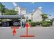 Exterior view of parking area with covered parking and walkway to unit at 3127 W Sligh Ave # 101C, Tampa, FL 33614