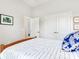 Bedroom featuring a bed with blue accents, plush carpet, and access to a private balcony at 3503 Graycliff Ln, Brandon, FL 33511