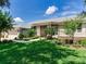Beautiful single-story home with well-manicured lawn, stone accents, and a welcoming front entrance at 3503 Graycliff Ln, Brandon, FL 33511