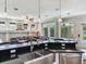 Kitchen island with stainless steel sink, granite countertop, and connections for appliances at 3503 Graycliff Ln, Brandon, FL 33511