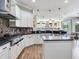 Open concept kitchen with a central island and views into the living space at 3503 Graycliff Ln, Brandon, FL 33511