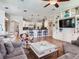 Spacious open-concept area combining living room and kitchen, with a comfortable couch at 3503 Graycliff Ln, Brandon, FL 33511