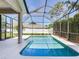 Relax in this screened-in pool with a clear blue water and a spacious deck area at 3503 Graycliff Ln, Brandon, FL 33511