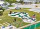 Overhead view of a uniquely designed putting range with an American flag displayed at 35045 Cynthia Ave # 35945, Zephyrhills, FL 33541