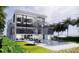 Modern home featuring a refreshing pool and patio with lounge chairs and outdoor entertaining space at 3611 Bayshore Ne Blvd, St Petersburg, FL 33703