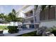 Luxury home featuring a private pool, covered balconies, and palm trees for a serene outdoor experience at 3611 Bayshore Ne Blvd, St Petersburg, FL 33703
