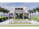 Stunning modern home with clean lines, lush landscaping, and private driveway for ultimate curb appeal at 3611 Bayshore Ne Blvd, St Petersburg, FL 33703