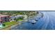 Breathtaking aerial view of a waterfront property featuring private docks with boat access and stunning landscaping at 3611 Bayshore Ne Blvd, St Petersburg, FL 33703