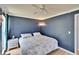 Bright bedroom with wood floors and a blue accent wall at 3733 Mendocino St, New Port Richey, FL 34655