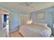 Welcoming bedroom with wood floors, closet and comfortable bedding at 3733 Mendocino St, New Port Richey, FL 34655
