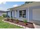 Charming entrance area with well-landscaped garden and trimmed front yard at 3733 Mendocino St, New Port Richey, FL 34655