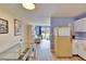 Bright, open kitchen with adjacent dining area and wood flooring at 3733 Mendocino St, New Port Richey, FL 34655