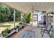 A screened-in patio with views of the backyard, perfect for relaxing at 3733 Mendocino St, New Port Richey, FL 34655