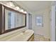 Bathroom featuring a large vanity and a glass-enclosed shower at 3906 W San Luis St, Tampa, FL 33629