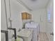 Functional laundry room features a utility sink, washer, and dryer, offering convenience and practicality at 3906 W San Luis St, Tampa, FL 33629