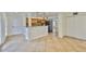 Spacious living room featuring an open floor plan and tile flooring throughout at 3906 W San Luis St, Tampa, FL 33629