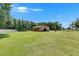 Exterior of beautiful barn with a well manicured lawn at 4312 James L Redman Pkwy, Plant City, FL 33567