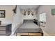 Cozy bedroom with a grey bedspread and mounted deer heads at 4312 James L Redman Pkwy, Plant City, FL 33567