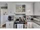 Functional kitchen with white cabinets, modern appliances, and plenty of storage space at 4312 James L Redman Pkwy, Plant City, FL 33567
