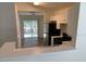 Bright kitchen featuring modern appliances and an open view to the patio through sliding glass doors at 513 Summer Sails Dr, Valrico, FL 33594