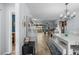 Cozy dining area adjacent to living space, featuring wood floors and neutral walls for a bright, airy atmosphere at 5660 80Th N St # B106, St Petersburg, FL 33709