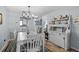 Cozy dining room with ample natural light, features a hutch and views to the kitchen and bedroom at 5660 80Th N St # B106, St Petersburg, FL 33709