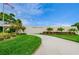Community entrance to Magnolia Sun Center with beautiful landscaping and well-maintained grounds at 5660 80Th N St # B106, St Petersburg, FL 33709