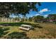 Relaxing community grounds with picnic table, BBQ and serene views of the nearby pond at 5660 80Th N St # B106, St Petersburg, FL 33709