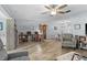 Inviting living space featuring wood floors, open layout, and ample natural light for a comfortable, airy feel at 5660 80Th N St # B106, St Petersburg, FL 33709