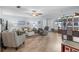Spacious living area with wood floors, neutral walls, and a bright ambiance for a relaxed, inviting atmosphere at 5660 80Th N St # B106, St Petersburg, FL 33709
