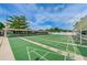 Community shuffleboard courts with shaded benches provide a social and recreational space at 5660 80Th N St # B106, St Petersburg, FL 33709