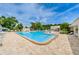 Large community swimming pool offering ample space for relaxation and recreation at 5660 80Th N St # B106, St Petersburg, FL 33709