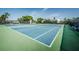 Community tennis courts offering residents space for recreation and exercise and promoting an active and healthy lifestyle at 5660 80Th N St # B106, St Petersburg, FL 33709