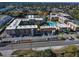Aerial view showcasing the community's layout with a pool and ample parking at 5820 N Church Ave # 147, Tampa, FL 33614