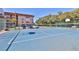 A community basketball court with clearly marked lines and hoops at 5820 N Church Ave # 147, Tampa, FL 33614