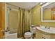 This bathroom offers a combined shower and tub with a white sink and toilet at 5820 N Church Ave # 147, Tampa, FL 33614