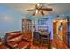 Cozy dining area with wood floors, a table, and brown leather seating at 5820 N Church Ave # 147, Tampa, FL 33614