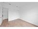 Bedroom features wood-look flooring and a closet with sliding doors at 6072 Silver Grass Ct, Nokomis, FL 34275