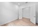 Bedroom featuring wood-look tile floors and an open closet space at 6072 Silver Grass Ct, Nokomis, FL 34275