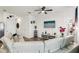 Spacious living room filled with natural light and featuring wood floors and contemporary decor at 6235 Bucket Ct, Gibsonton, FL 33534