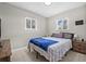 Bright bedroom with neutral paint, natural light, and tiled flooring at 6944 80Th N Ave, Pinellas Park, FL 33781