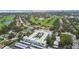 A unique aerial perspective highlighting proximity to the community and nearby golf course at 701 Poinsettia Rd # 322, Belleair, FL 33756
