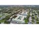 Aerial view showing the community nestled amongst mature trees at 701 Poinsettia Rd # 322, Belleair, FL 33756